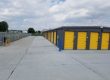 Fence at V's Self storage and wide driving lanes and security gate